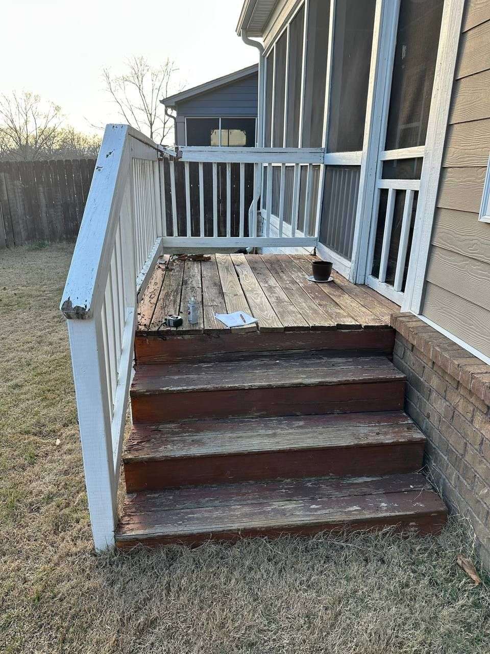 Rotted back door landing and steps before replacement in Chattanooga, TN