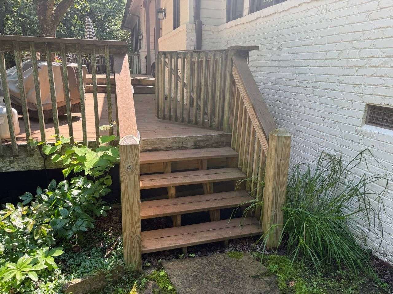 Elevated deck before framing rebuild and aluminum railing installation in Chattanooga, TN